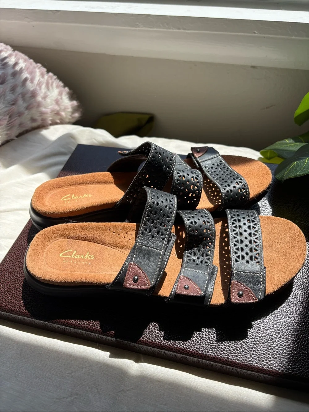 Clarks Black Laser-Cut Triple Strap Slide Sandals with Brown Insole